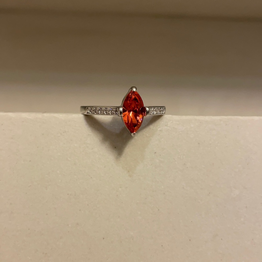 Elliptic Shape Gemstone Center Ring